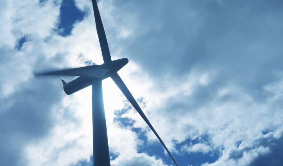 Low angle view of turbine on windfarm